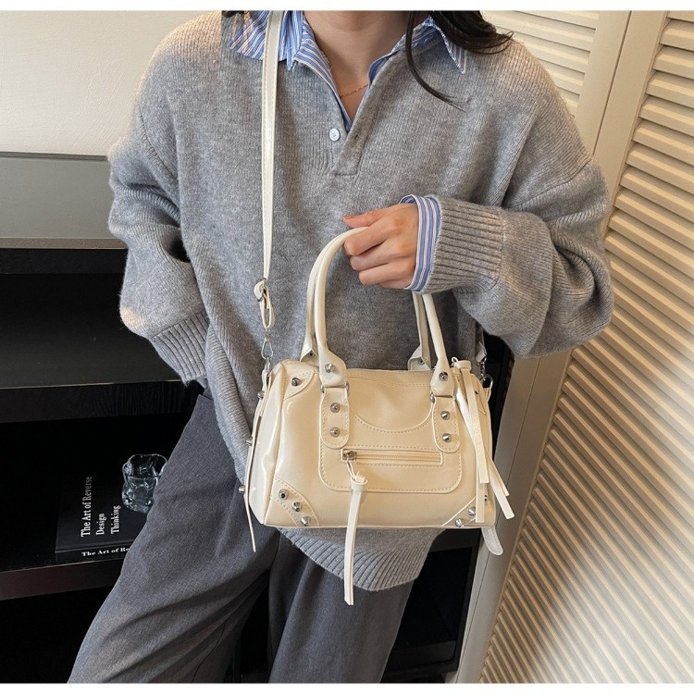 حقيبة نسائية كلاسيكية من الجلد - مراجعة Top Handle Patent Bag وسعره