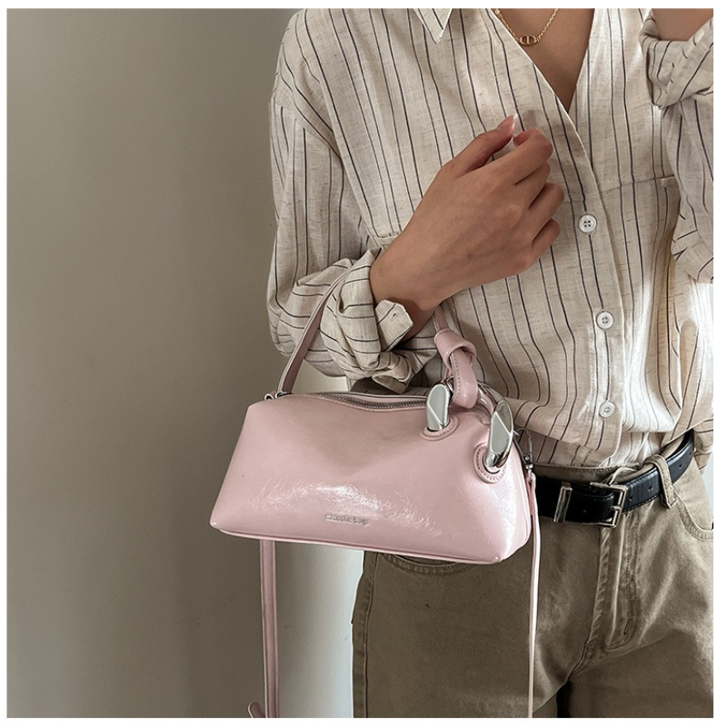 حقيبة يد نسائية أنيقة من الجلد - مراجعة Top Handle Patent Bag وسعره
